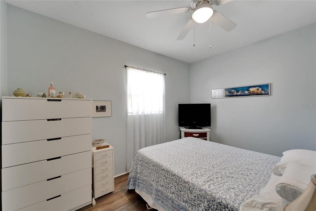 Light and bright second bedroom that overlooks back yard