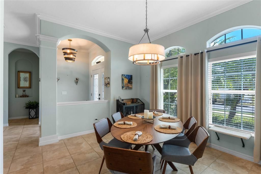 A formal dining room at the front of the room gives you flexible square footage to use as you need.