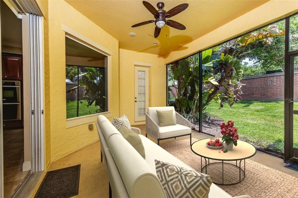 Virtually staged. Screened enclosed Lanai