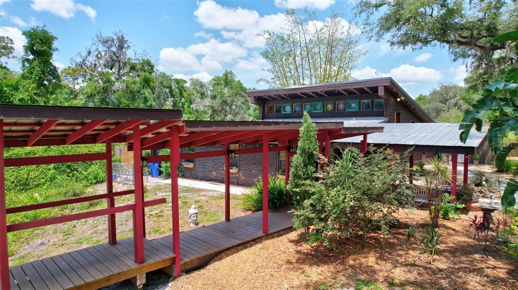 CCOVERED WALKWAY FROM THE HOUSE TO THE STUDIO