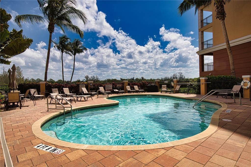 Heated salt water pool with grill and cabana