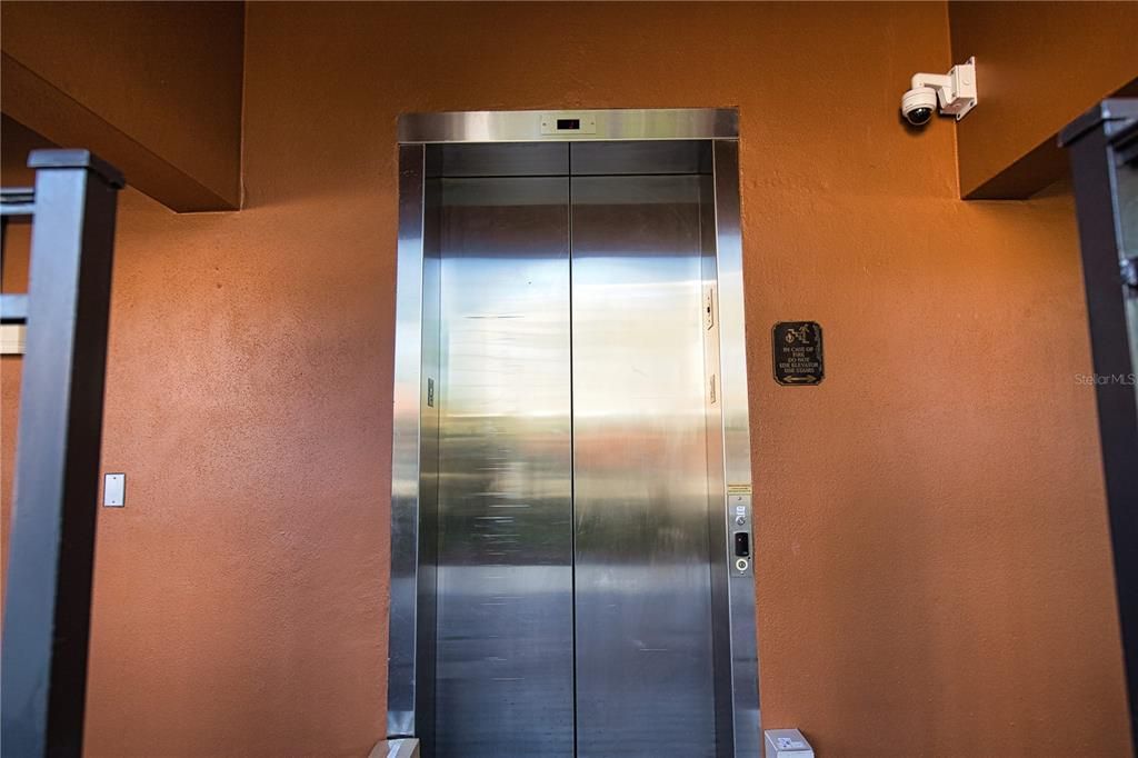 Building elevator with security features