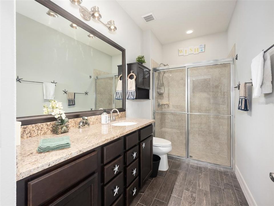 Hall bath with walk-in shower.