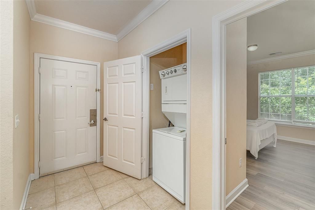 Foyer with stackable washing machine