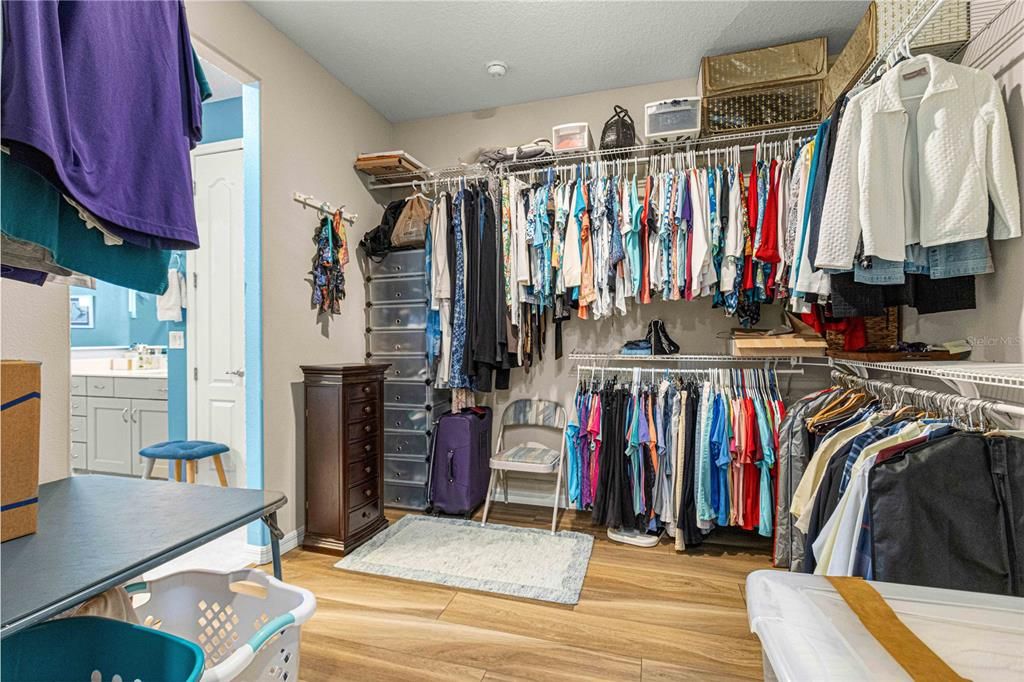 Upgraded Closet to allow entry from bath or laundry