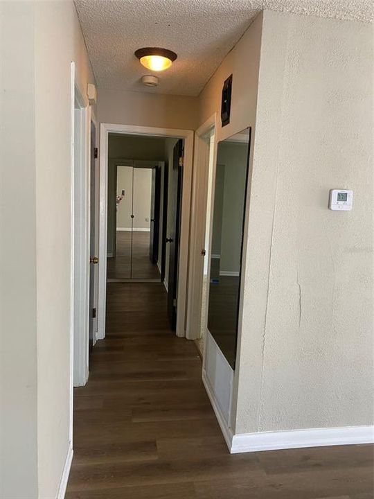 hallway to bedrooms and bathroom