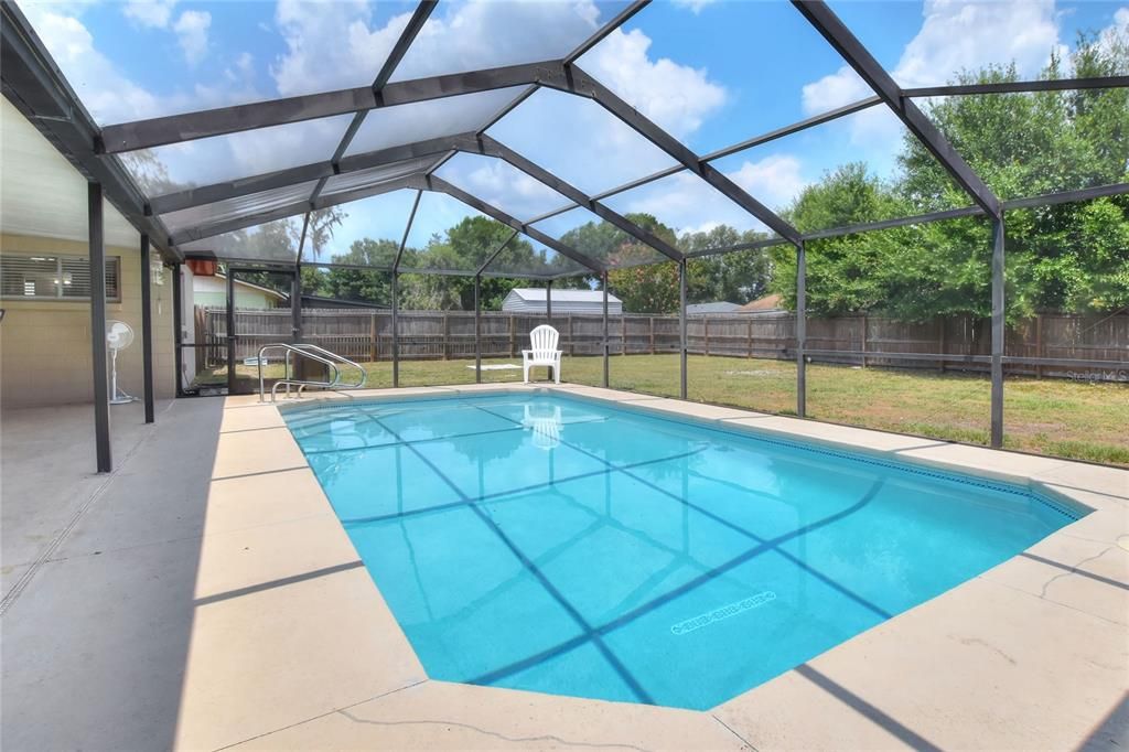 Large Pool with spacious  Lanai and Deck area