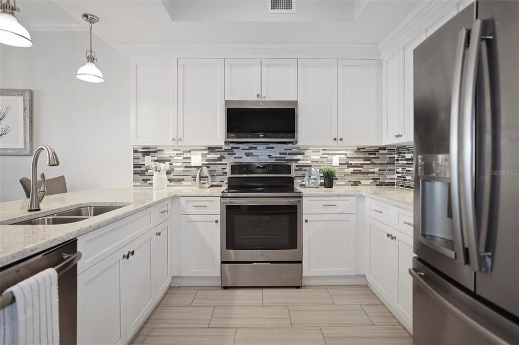 Bright Kitchen with Upgraded Quartz countertops