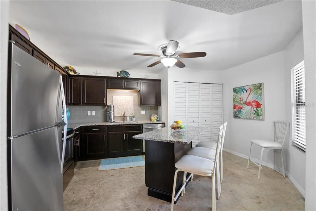 Another View of this Gorgeous Kitchen-Updated Stainless Steel Appliances-Laundry closest with full size Washer and Dryer