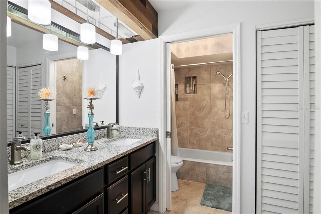 Totally Renovated Master Bath with Fabulously Tiled Shower, Granite Countertops, Updated Lighting & a Beautiful Master Walk-In Closet
