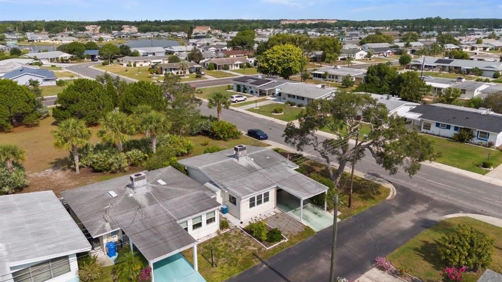 Aerial of the front elevation showing the surrounding area.