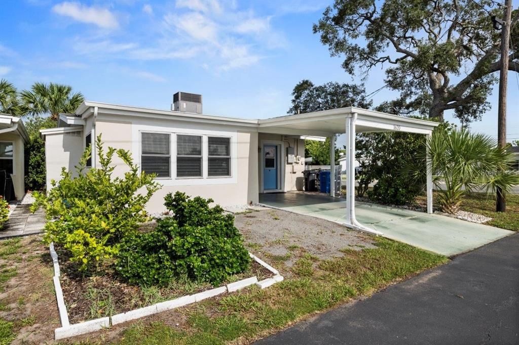 Front elevation showing the car port.