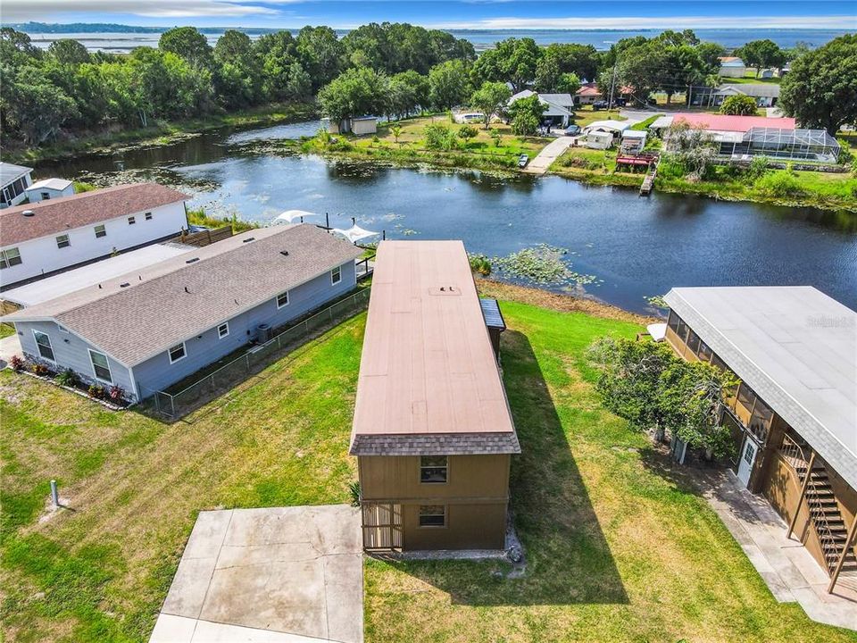 2 story home / duplex on the canal that leads into Crooked Lake. Crooked Lake is one of the most pristine, clear, spring fed lakes in FL and offers 5500 acres of fun for anyone who enjoys boating, fishing, water skiing, or the tranquil serenity of lakefront living.