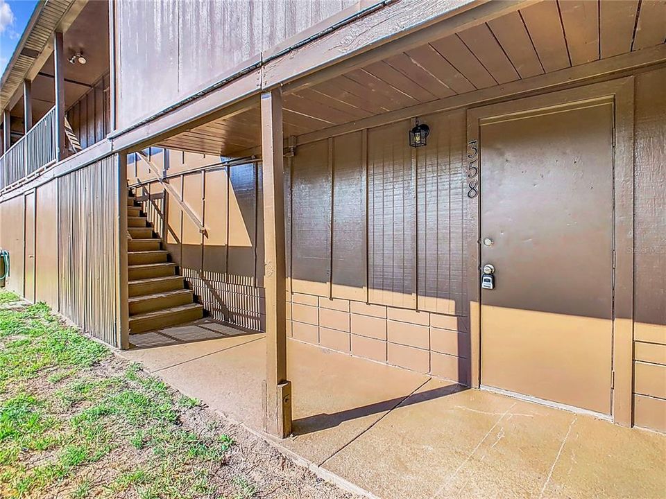 Stairs leading to the upstairs unit.