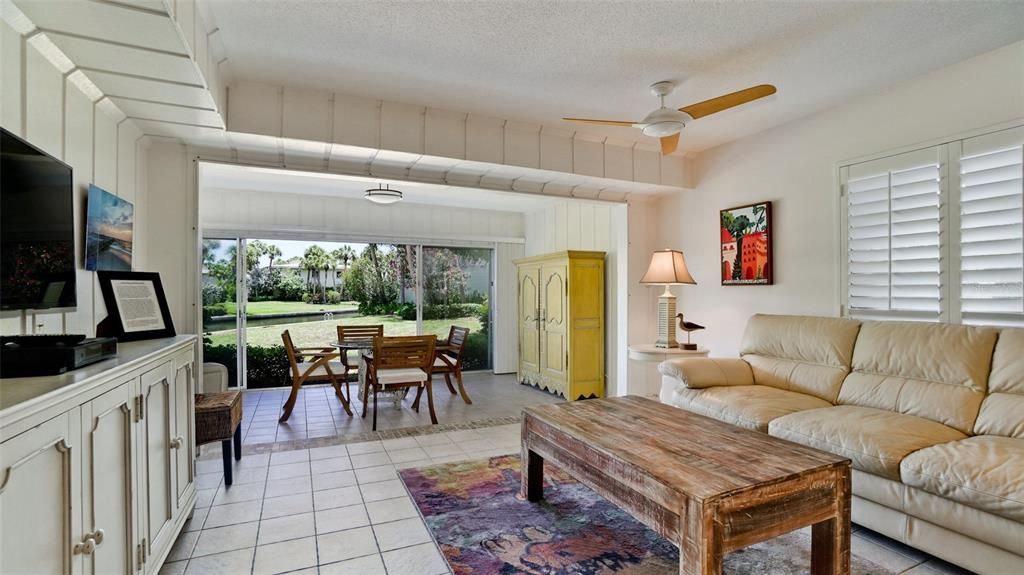 THIS LOVELY DOWNSTAIRS CONDO IS BEING OFFERED FURNISHED & HAS MANY UPDATES INCLUDING HANDSOME LIGHTING FIXTURES, CONTEMPORARY FANS, BERMUDA SHUTTERS ON ALL WINDOWS.