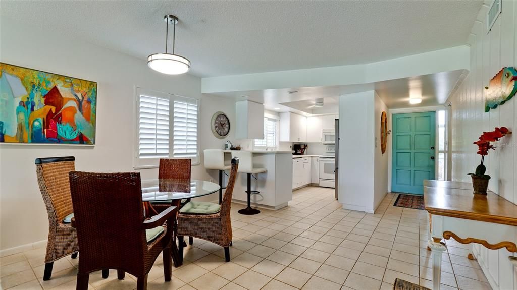 GREAT ROOM WITH DINING AREA & LIVING ROOM LEADING TO KITCHEN