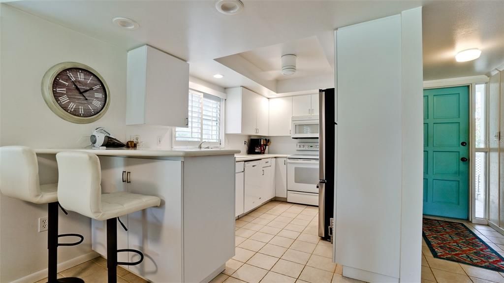 OPEN KITCHEN WITH COUNTER FOR LUNCH OR WATCHING THE COOK PREPARE DINNER