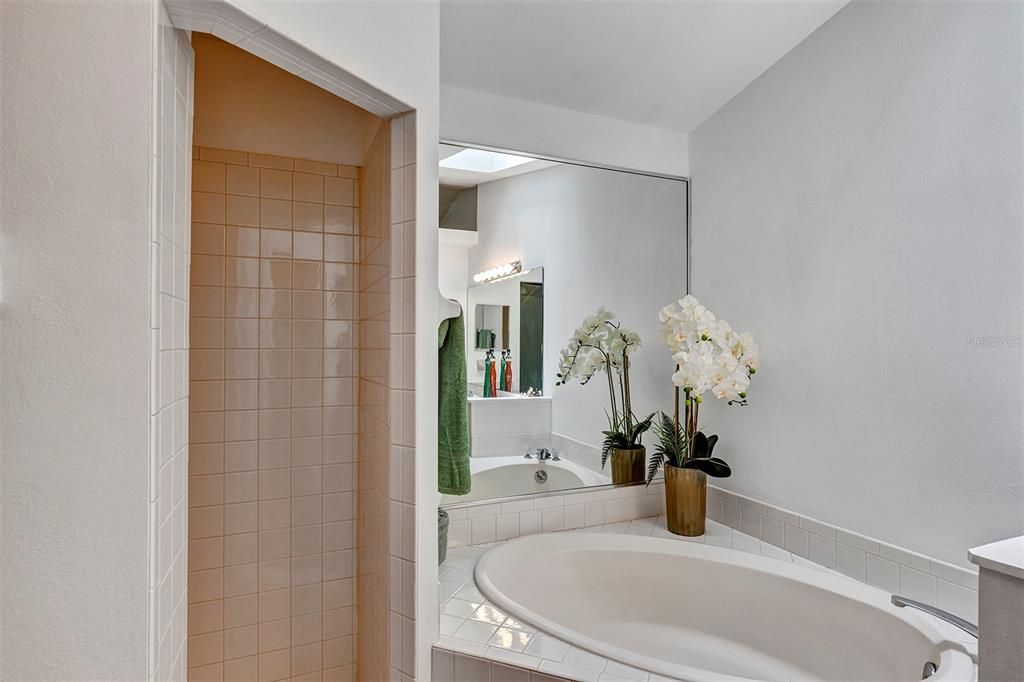 Separate shower on left Garden tub on right