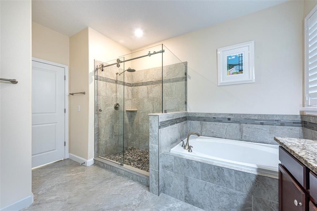 The door to the left of the shower also leads to the laundry room in case you want to cut through to the kitchen.