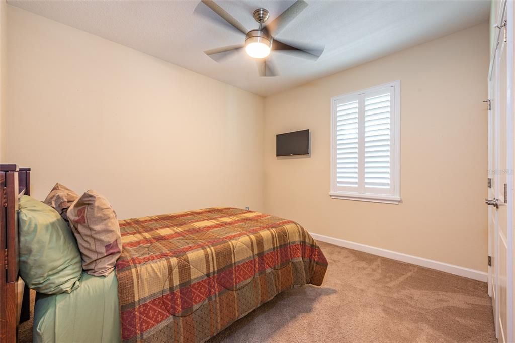 Bedroom 3 has a ceiling fan.