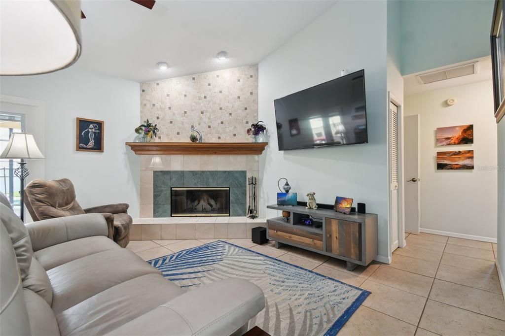 Family area with wood burning fireplace.