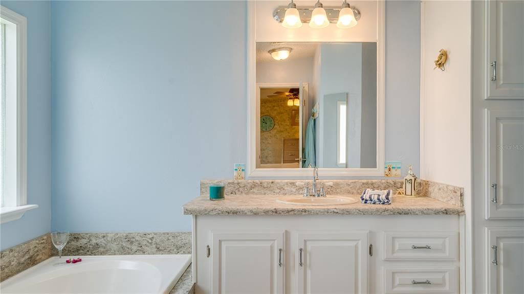 This recently remodeled master bath has it all.