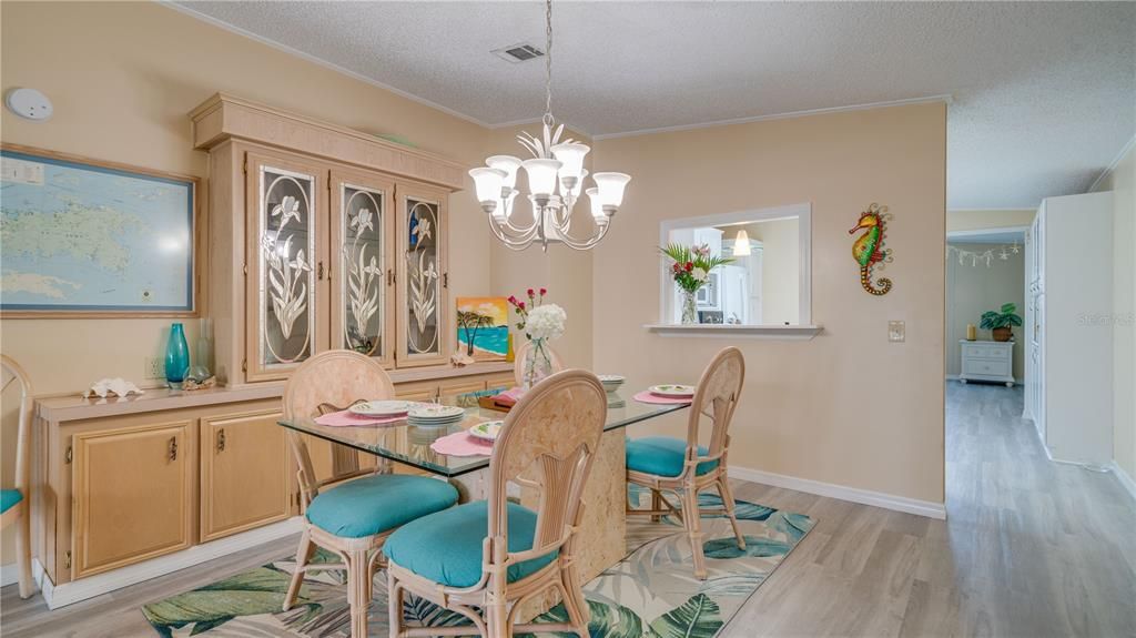 The dining area built-in provides the perfect locale to display your fine china or your collectibles.
