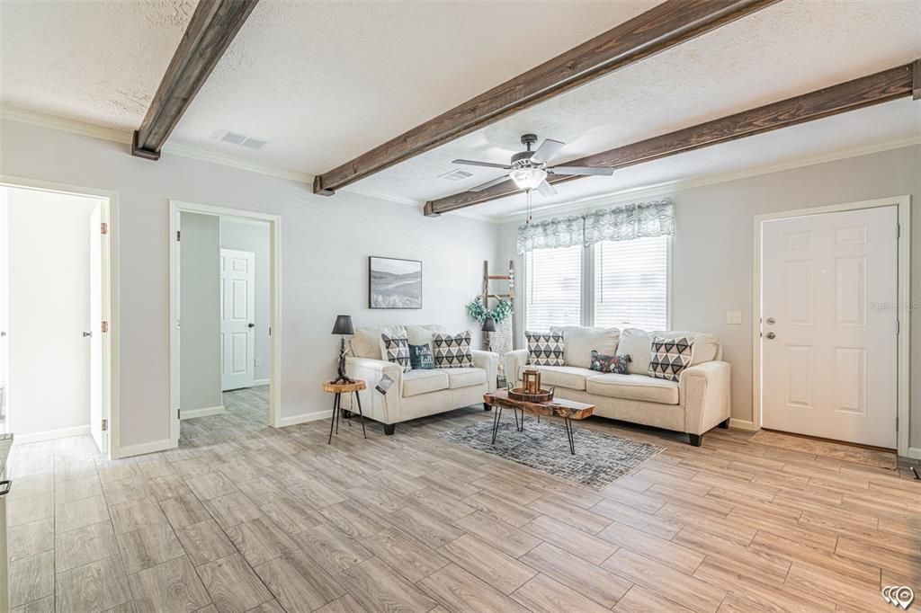 Primary bedroom towards living room(Manufacturer Stock Photo)