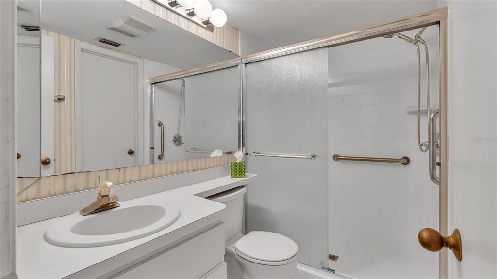 Downstairs bathroom with walk in shower