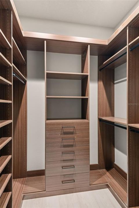 Master Closets (1 ea on either side of the hallway to Master Bathroom