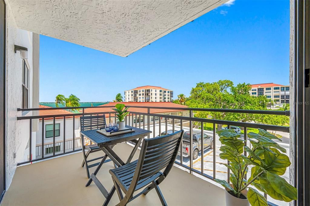 Balcony view overlooking designated parking spot