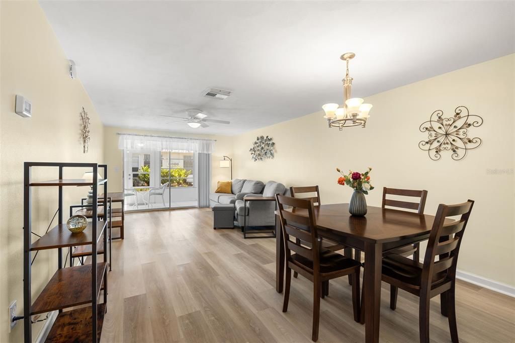 View toward the dining/living room combo.  The condo comes partially furnished and ready to move in!