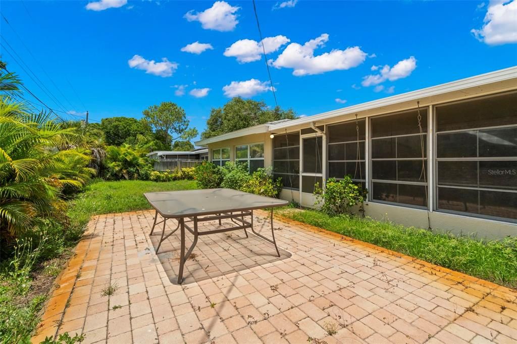 Pavered patio in backyard