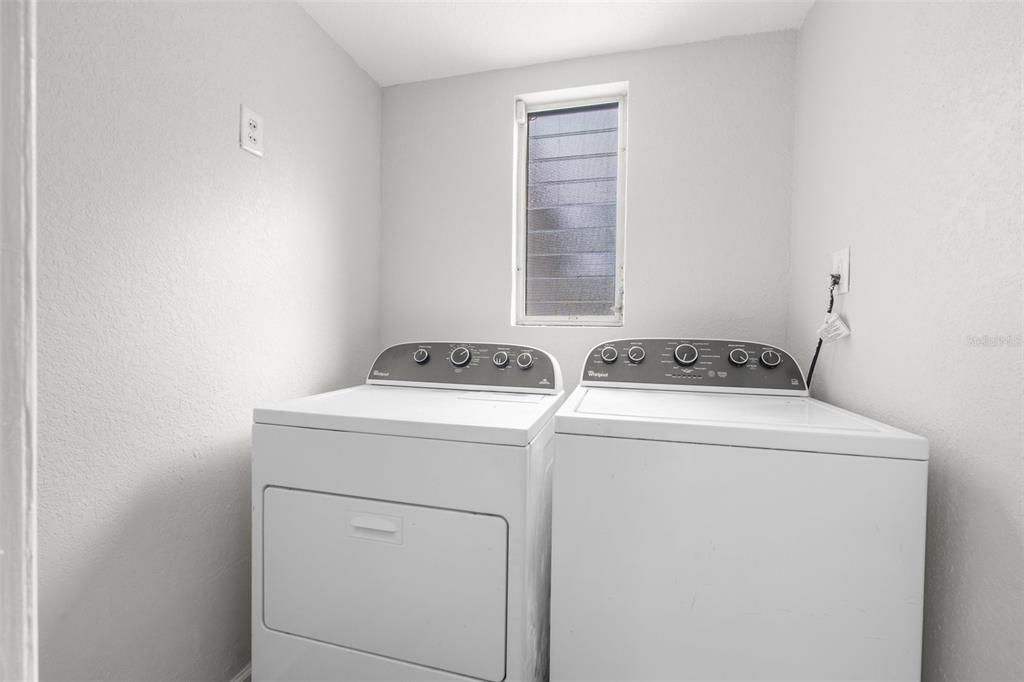 Indoor Laundry next to the primary bedroom