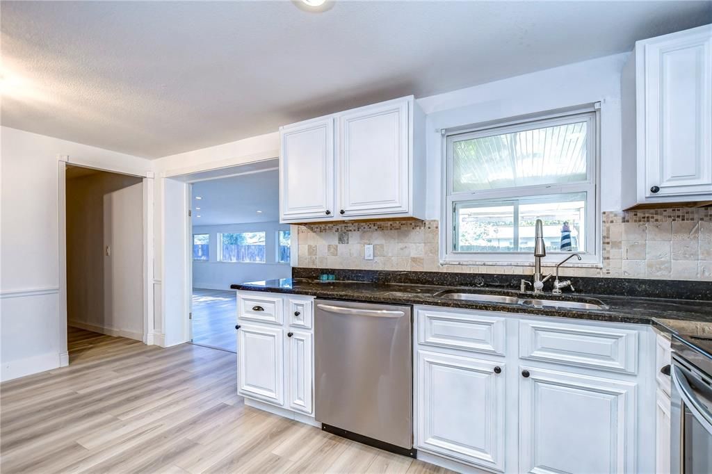 Granite counter tops and tile backsplash!