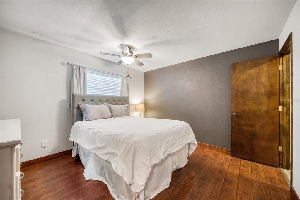 Primary bedroom with walk-in closet