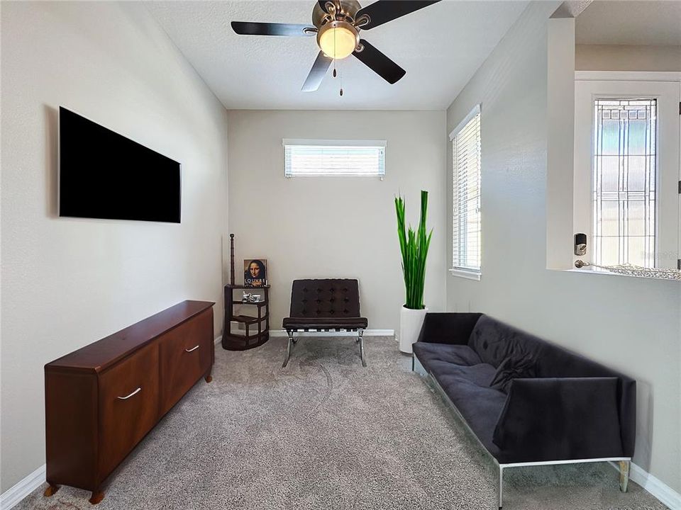 Viturally staged partially - Den/office media room is inviting and can be used for whatever fits your needs