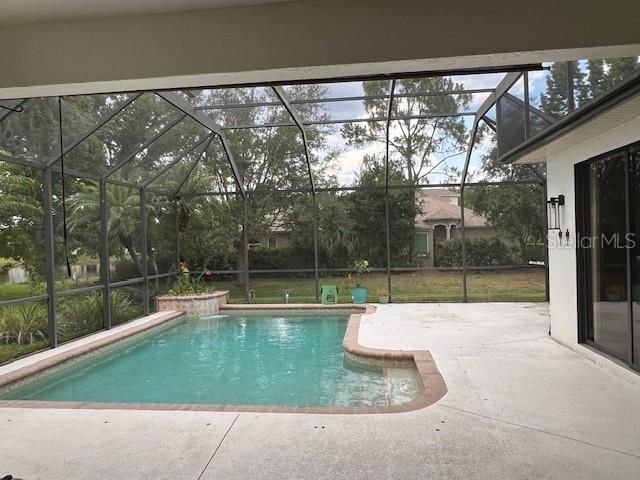 Pool and large screened-in pool and under cover area