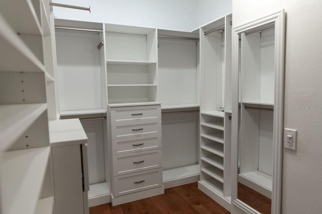 Custom Master closet with built-in shelving