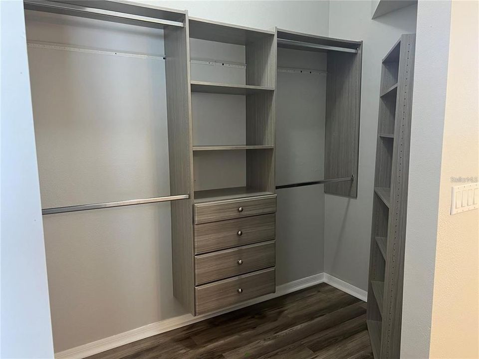 Custom shelving in Master Closet