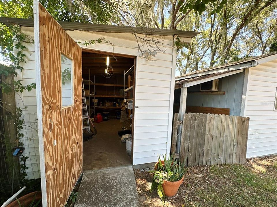 Shed and workshop with well in between