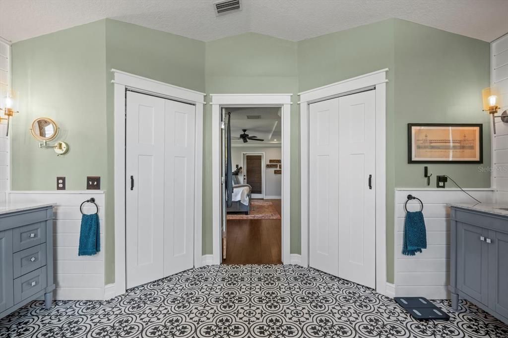 His and hers closets, and more shiplap detailing.