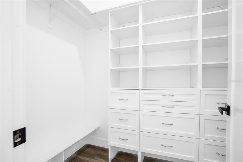 primary bedroom walk in custom built closet