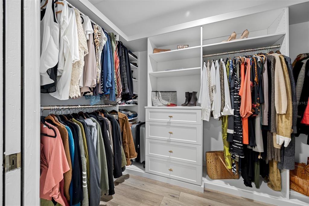 Large custom closet in the primary bedroom, just outside the bathroom