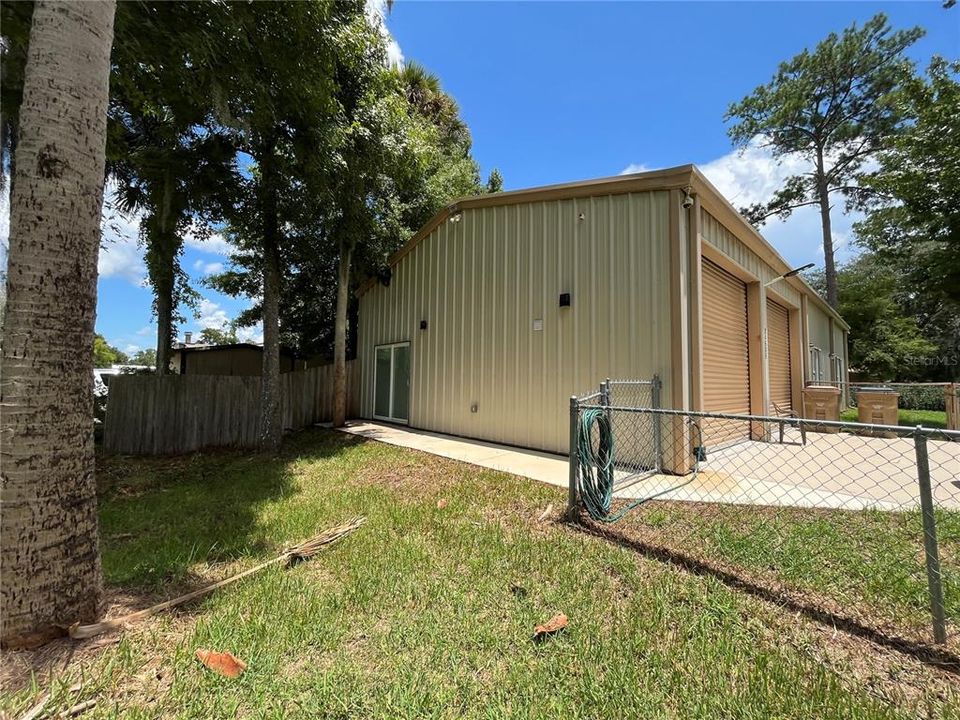 Side exterior with suite hurricane proof sliding glass doors.