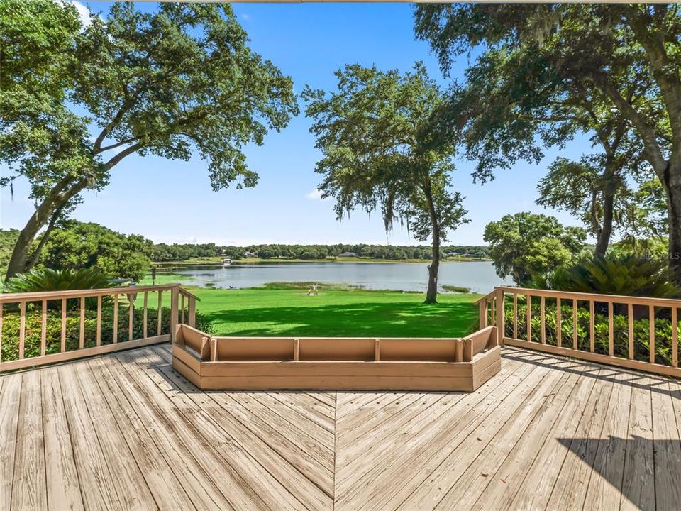 View from sunroom showing main deck and Lake Myrtle