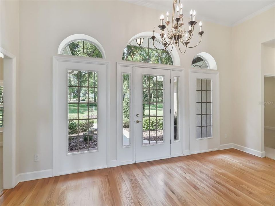 Front entry with hardwood flooring