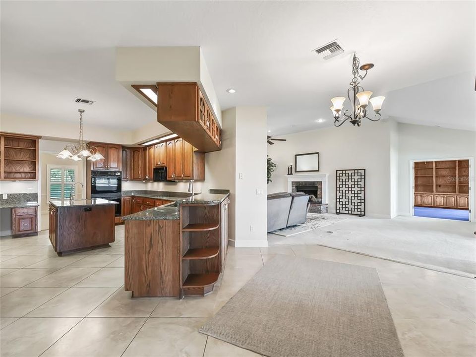 Looking across the home - showing kitchen, main living area and access to study on the right