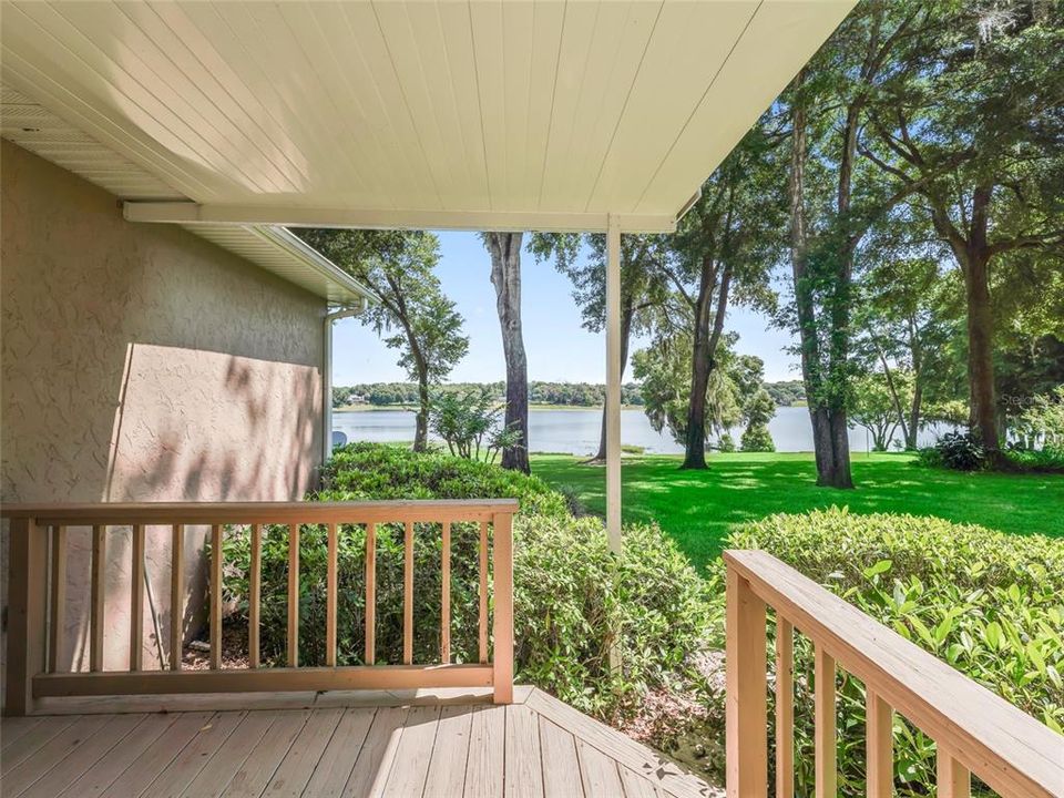 Small private deck accessed from storage area with great lake views