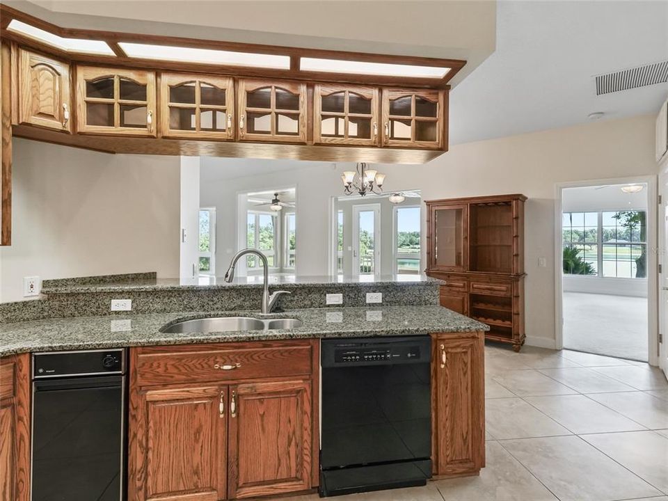 Partial kitchen view showing raised bar eating area